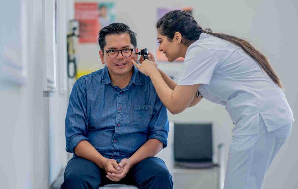 Eustachian tube exam by ENT specialist in Burbank, CA, clinic.